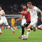 World Cup qualifiers: Albania’s match against Poland halted after players hit by bottles